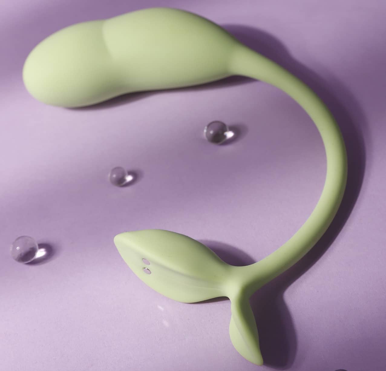 The Luxora therapeutic toy with sage green design